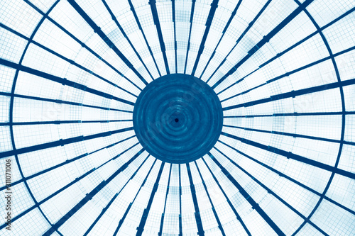 Digitally rendered image of architecture with concentric structure. Realistic though unreal transparent round glass roof, dome or ceiling. Abstract geometric background. Radial lines and sectors.