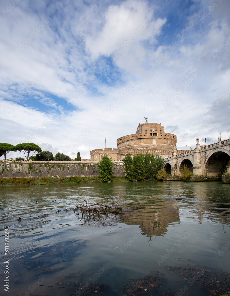 River Tiber and Castle of St Angelo on the other side as seen from under the bridge