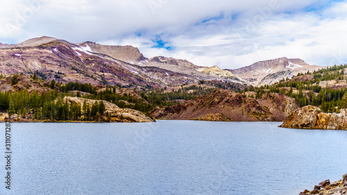 The clear glacial water of Tioga Lake at an elevation of 2938m on Tioga Pass in the eastern part of Yosemite National Park, California, United States photo