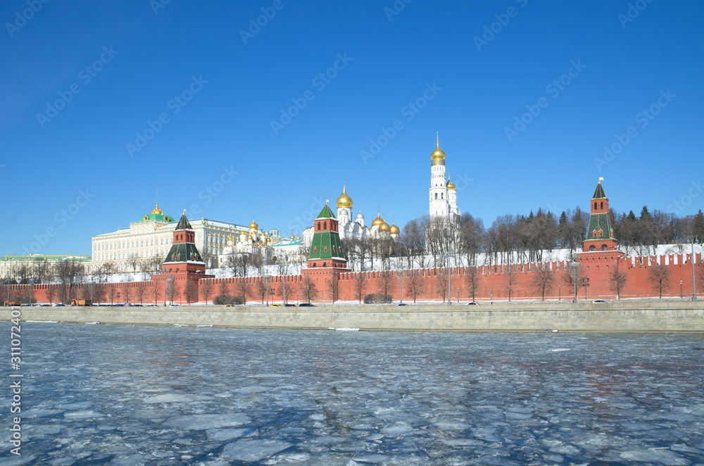 Kremlin embankment and the Moscow Kremlin on a Sunny spring day. Moscow, Russia