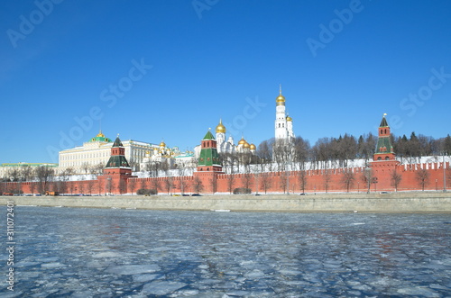 Kremlin embankment and the Moscow Kremlin on a Sunny spring day. Moscow, Russia