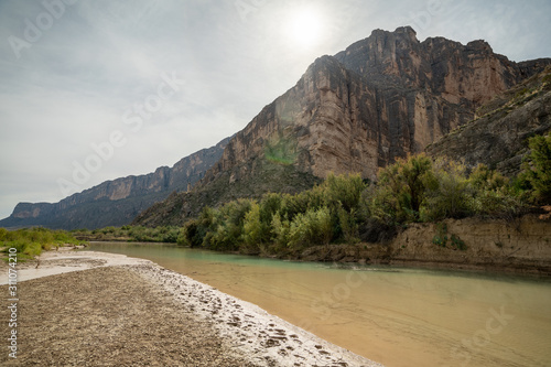 The Rio Grande River cuts a canyon through the plateu that seperates the US and Mexico. photo