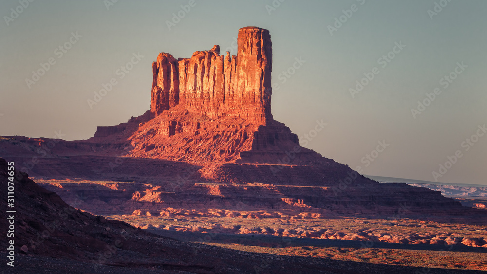 Sunset in the famous Monument Valley, on the border between Arizona and Utah. Navajo tribal park