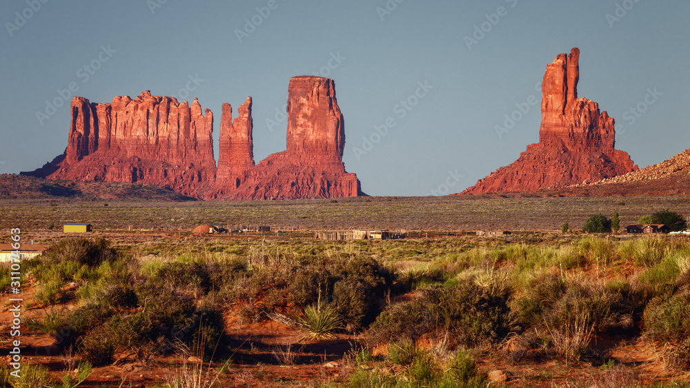 Sunset in the famous Monument Valley, on the border between Arizona and Utah. Navajo tribal park