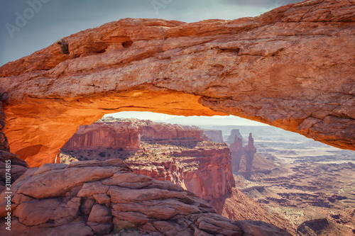 Mesa Arch is a sandstone arch on the eastern edge of the island on the Sky table in Canyonlands National Park in northern San Juan County  Utah