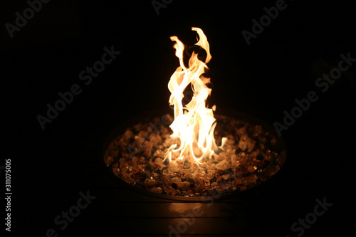 Fototapeta Naklejka Na Ścianę i Meble -  Fire in the dark inside a fire pit