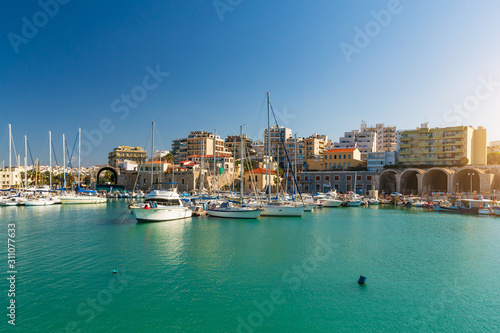 Day foto of old venetian harbor with boats in Heraklion © velishchuk
