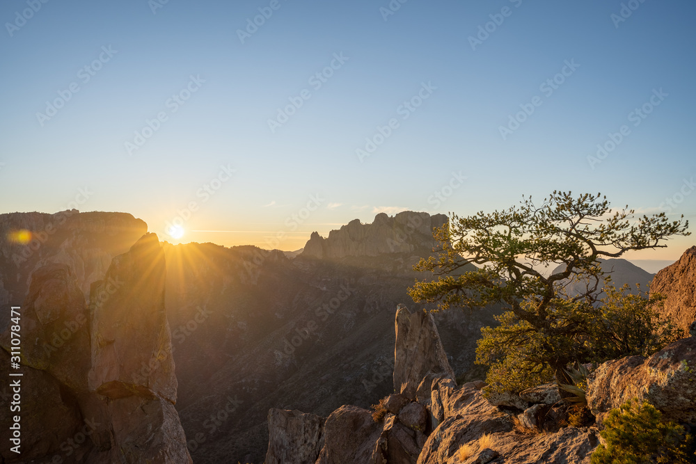 The sun sets over the mountains in West Texas.