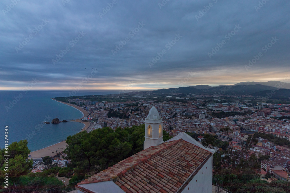 Nice village of Blanes at sunset, with a spectacular sky