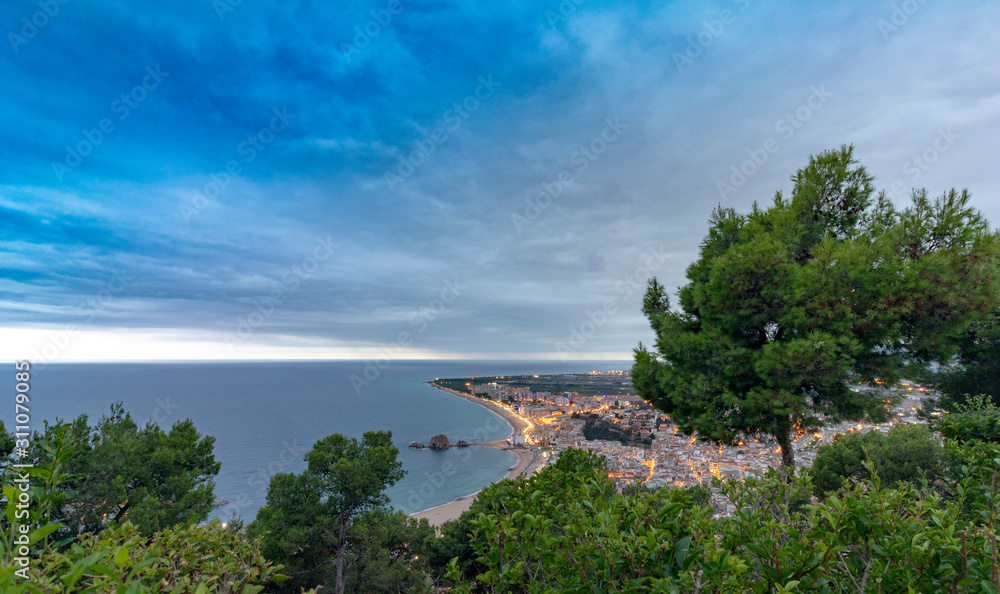 Nice village of Blanes at sunset, with a spectacular sky