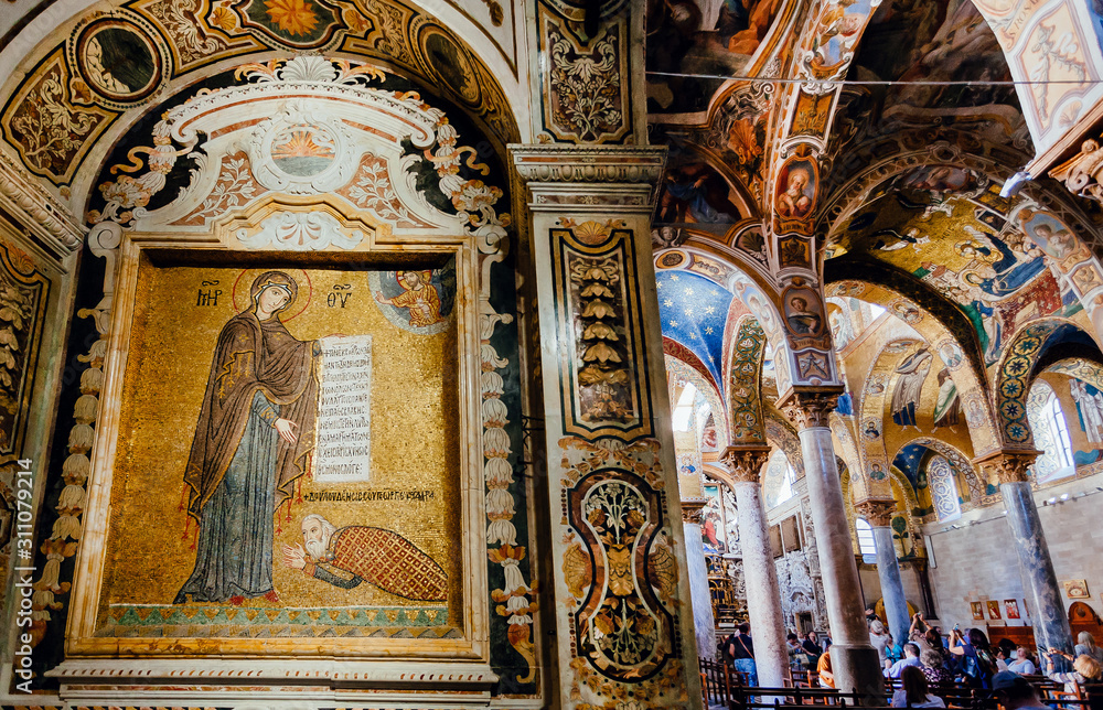 Byzantine mosaics and marble columns inside the 12th century Martorana cathedral, Palermo. Italy.