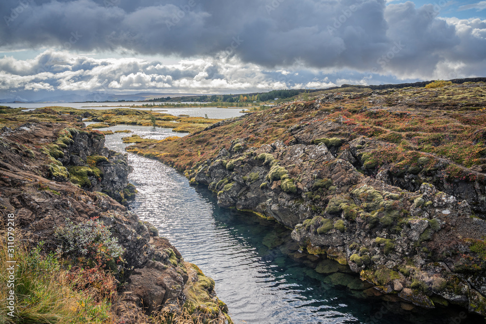 Fototapeta premium Þingvellir or Thingvellir national park in Iceland, is a site of historical, cultural, and geological significance, the fissure devides the tectonic plates of America and Eurasia