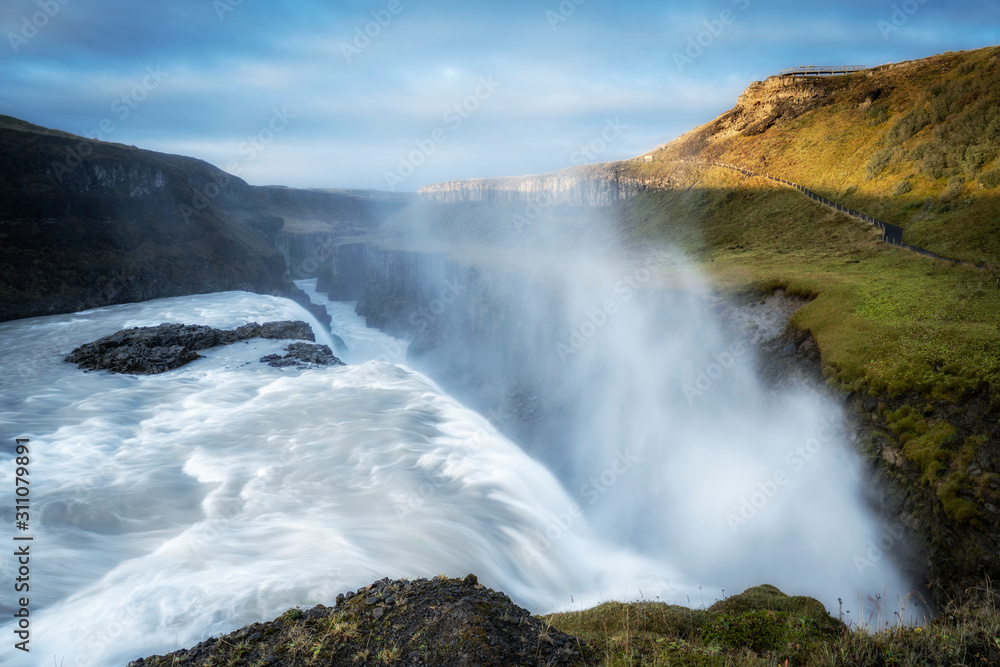 Gullfoss waterfall at sunrise is the biggest waterfall in Iceland Gullfoss waterfall at sunrise is the biggest waterfall in Iceland