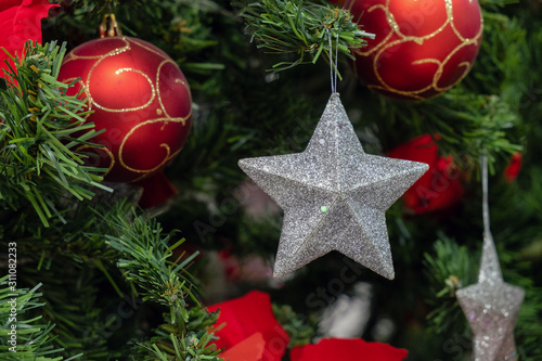 Christmas and new year decorations with lights and Christmas tree in the background. new year concert and background. photo