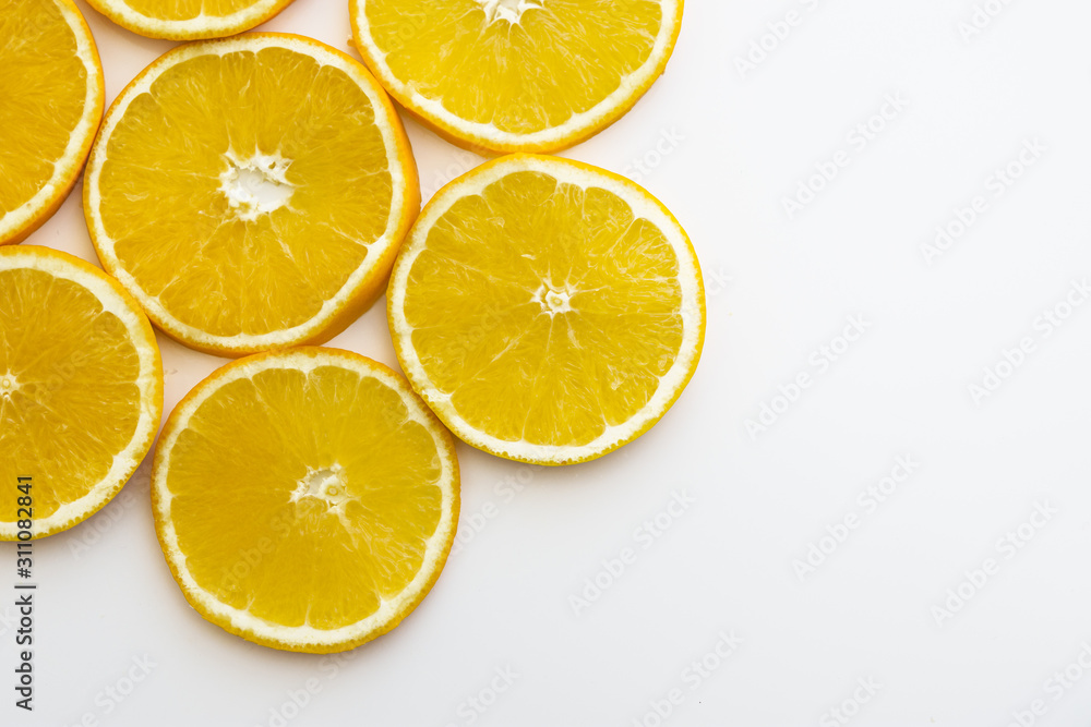 Yellow oranges on white neutral background