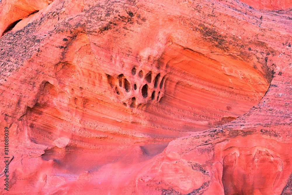 Red and Orange Sandstone Rock Formations along the Bone Wash Elephant Arch Trail in Red Cliffs National Desert Reserve in Saint George, Utah. United States. Red and Orange Sandstone Rock Formations along the Bone Wash Elephant Arch Trail in Red Cliffs National Desert Reserve in Saint George, Utah. United States.