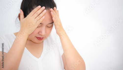 Picture of a girl with severe headache The handle on her head, health problems, stress, medical conditions or rest, a rest in a white background