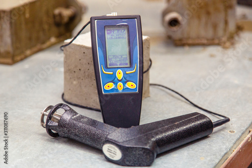 Device for the study of concrete and determine the properties, density and quality of the finished concrete.  photo