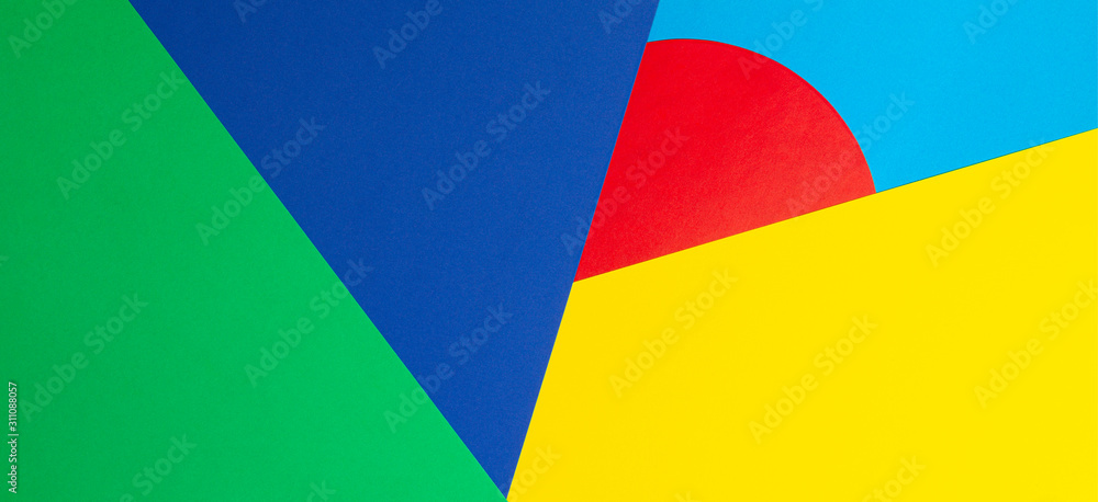Abstract geometric shape yelllow, blue, red, green color paper background Abstract geometric shape yelllow, blue, red, green color paper background
