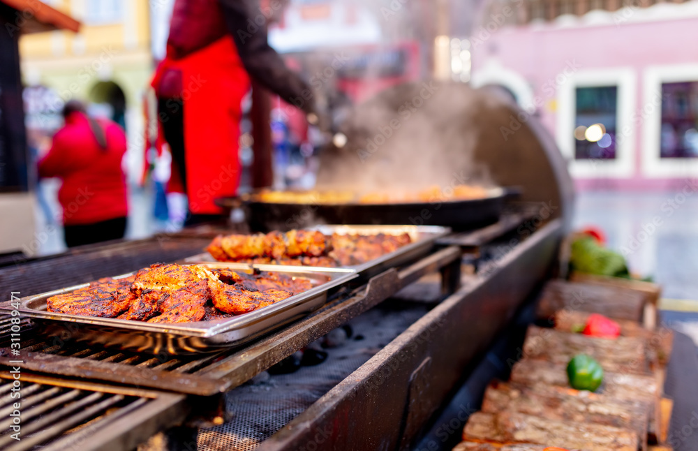 Obraz premium traditional sausages in Christmas market in Wroclaw, Poland