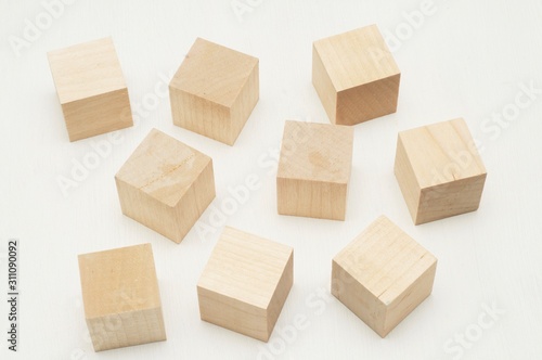 Obraz na płótnie Wooden cubes on white background 