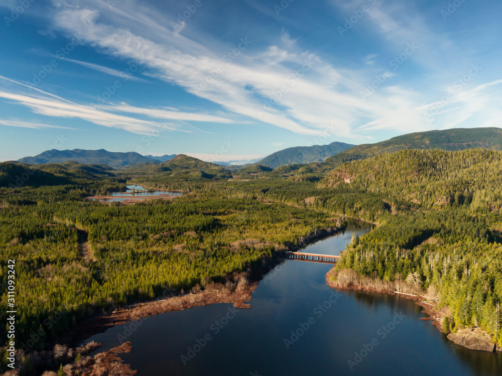 Beautiful Aerial Panoramic View of Kennedy Lake during a vibrant sunny day. Located on the West Coast of Vancouver Island near Tofino and Ucluelet, British Columbia, Canada.