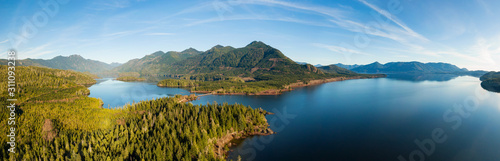 Beautiful Aerial Panoramic View of Kennedy Lake during a vibrant sunny day. Located on the West Coast of Vancouver Island near Tofino and Ucluelet, British Columbia, Canada. photo