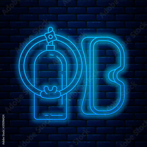 Glowing neon line Diving mask and aqualung icon isolated on brick wall background. Oxygen tank for diver. Extreme sport. Sport equipment. Vector Illustration