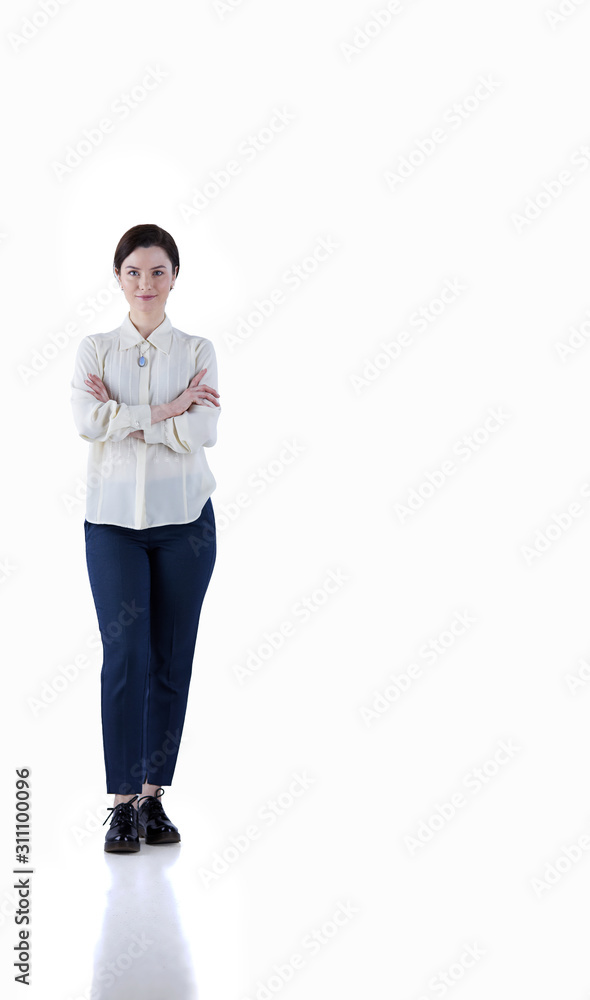 Portrait of cheerful young woman standing arms crossed over white background Portrait of cheerful young woman standing arms crossed over white background