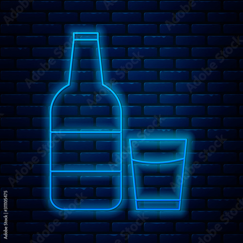 Glowing neon line Closed glass bottle with milk and glass icon isolated on brick wall background. Vector Illustration