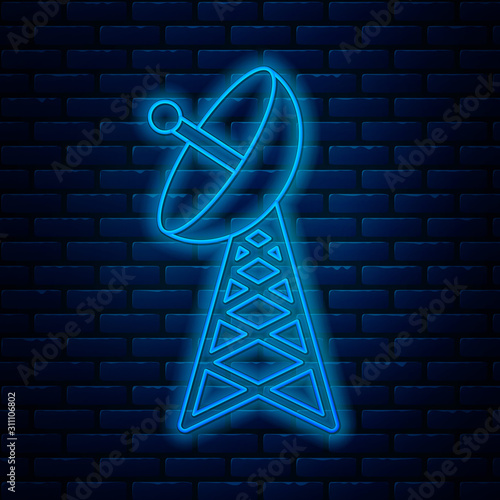 Glowing neon line Radar icon isolated on brick wall background. Military search system. Vector Illustration