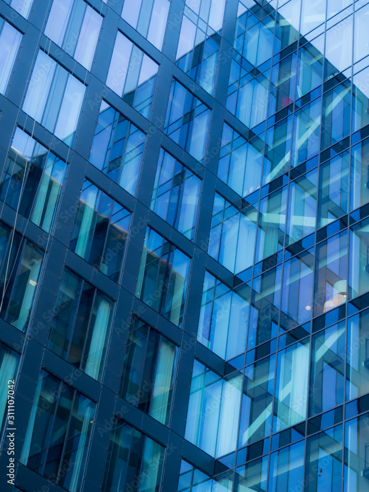 Blue reflections in the glass of a building Blue reflections in the glass of a building
