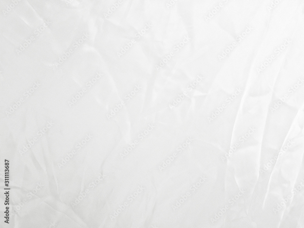 Fototapeta premium Soft white wrinkled fabric background