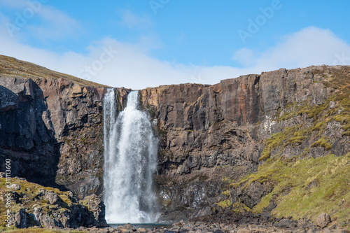 Fototapeta Naklejka Na Ścianę i Meble -  Waterfall gufufoss in river Fjardara in Seydisfjordur in east Iceland