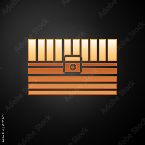 Gold Antique treasure chest icon isolated on black background. Vintage wooden chest with golden coin. Vector Illustration