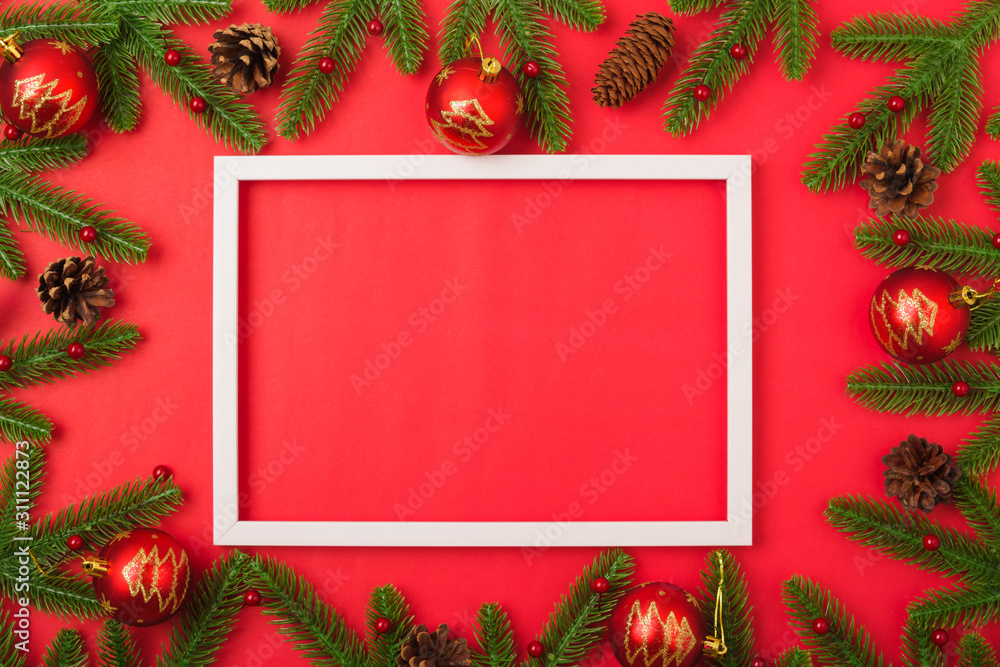 Fototapeta premium Happy new year or christmas day top view flat lay fir tree branches and decoration photo fram