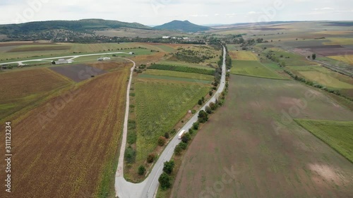 Aerial drone shot over the countryside roads in Bulgaria photo