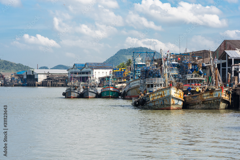Parts of the fishing fleet are moored at the pier in the industrial estate of the Ranong fishing harbor in the south-west of Thailand