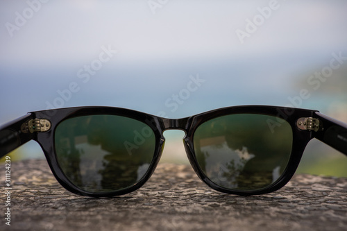 sunglasses on blue background