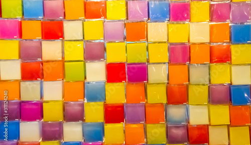 A variety of colorful candles in candle shops