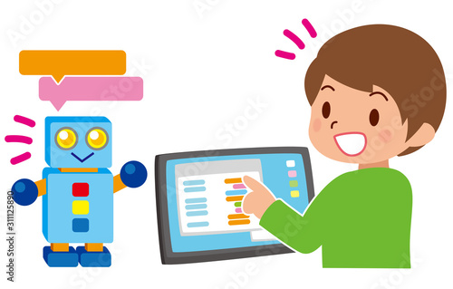 タブレットでプログラミング学習する子供