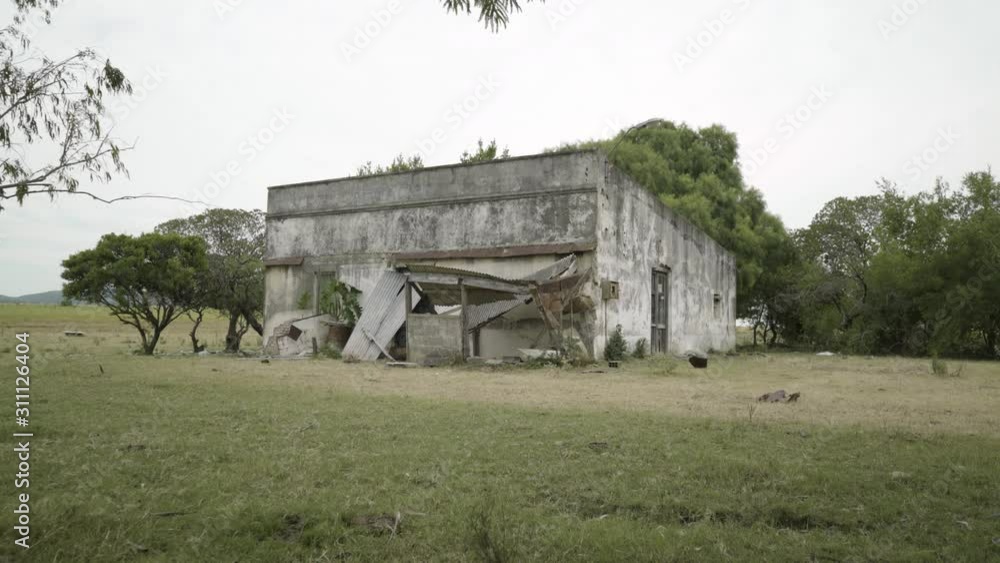 Abandoned Farm House Facade on Green Meadow Abandoned Farm House Facade on Green Meadow