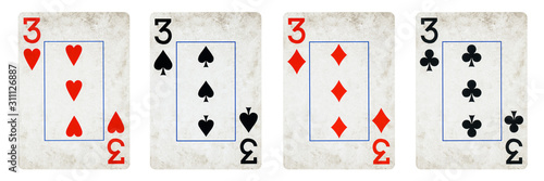 Four Playing Cards Isolated on White Background, Showing Three from Each Suit - Hearts, Clubs, Spades and Diamonds. photo