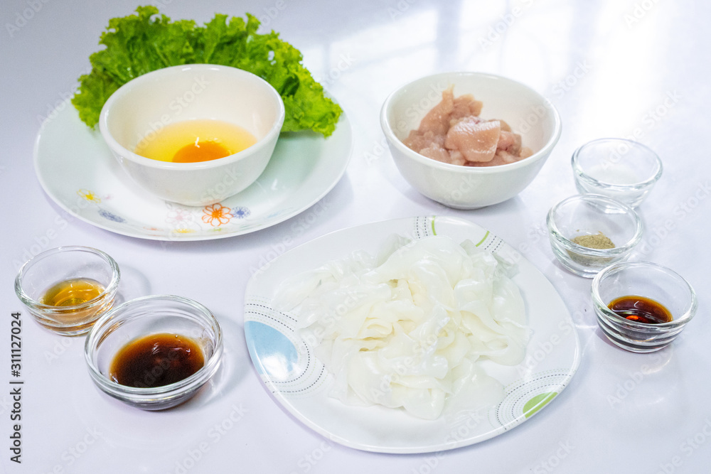 ingredients for cook Kuaitiao Khua Kai stir fried noodle with chicken ingredients for cook Kuaitiao Khua Kai stir fried noodle with chicken