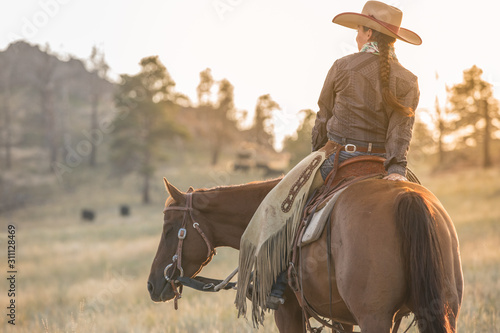Cowgirl at Sunset photo