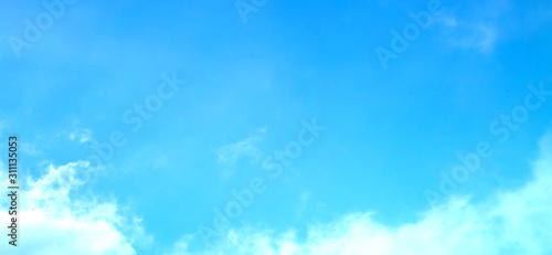    blue sky with white clouds as a background  bright natural beautiful sky