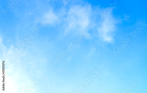    blue sky with white clouds as a background  bright natural beautiful sky