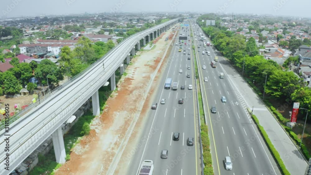 Beautiful cityscape with toll road and railway