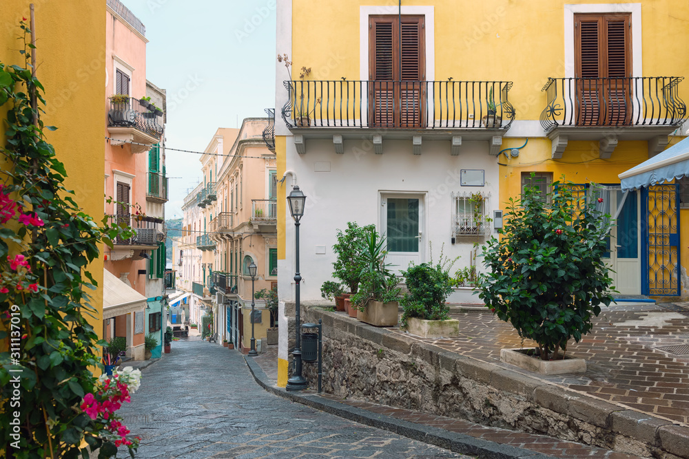 Obraz premium a beautiful typical multicolored street in Lipari, Aeolian islands, Italy.