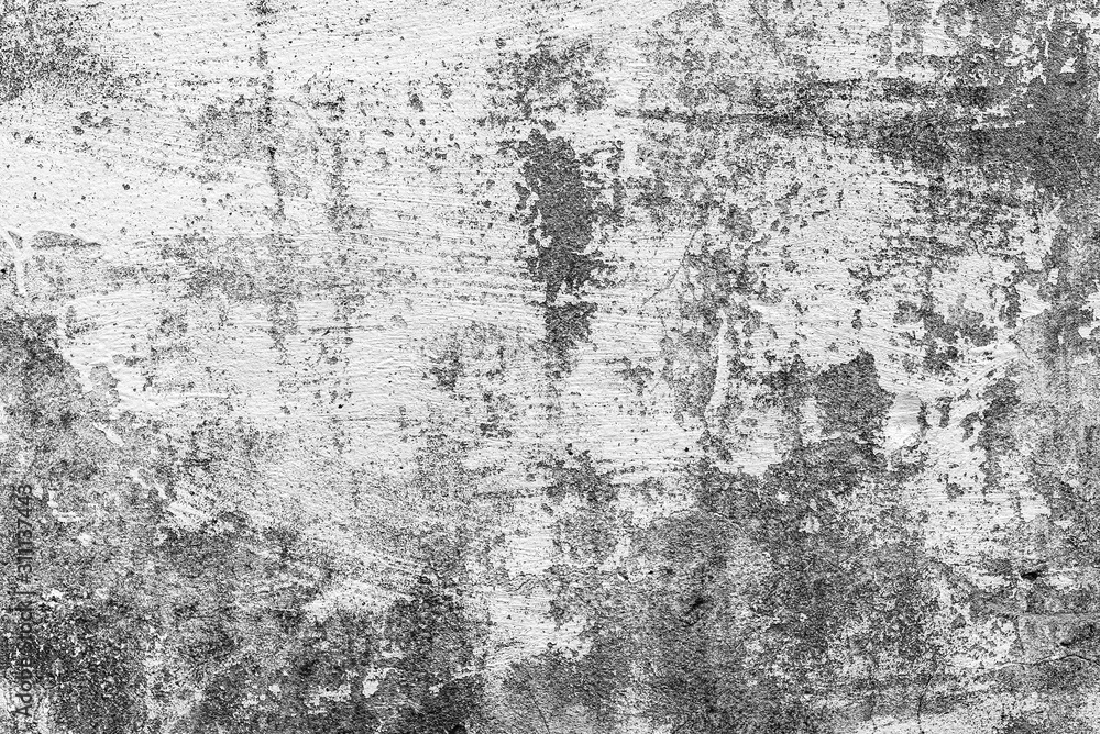 Fototapeta premium Texture of a concrete wall with cracks and scratches which can be used as a background